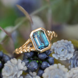 2.15ct Emerald Cut Madagascar Sapphire Wandering Vine Low Profile Bezel Split Shank Ring in 14k Yellow Gold