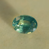 7.75CT OVAL MADAGASCAR SAPPHIRE, GREEN WITH YELLOW AND TEAL, 13.6X10.2X6.7MM