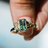 1.45ct Untreated Montana Sapphire Wandering Vine Low Profile Bezel Ring with Pear Diamond in 18k Yellow Gold