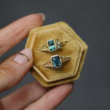 1.45ct Untreated Montana Sapphire Wandering Vine Low Profile Bezel Ring with Pear Diamond in 18k Yellow Gold