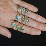 0.73ct Oval Unheated Montana Sapphire and Trillion Diamond Low Profile Ring in 14k Yellow Gold