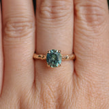 1.75ct Precision Cut Teal Oval Montana Sapphire Four Prong Evergreen Hidden Halo Solitaire in 14k Yellow Gold