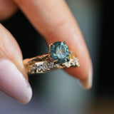 1.75ct Precision Cut Teal Oval Montana Sapphire Four Prong Evergreen Hidden Halo Solitaire in 14k Yellow Gold