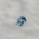 2.08CT ROUND MADAGASCAR SAPPHIRE, BICOLOR BLUE AND WHITE, UNTREATED, 7.5X4.9MM