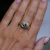 1.93ct Untreated Oval Brilliant Nigerian Parti Sapphire East-West Bezel Solitaire Alluvial Style Ring in 14k Green Gold