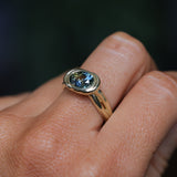 1.93ct Untreated Oval Brilliant Nigerian Parti Sapphire East-West Bezel Solitaire Alluvial Style Ring in 14k Green Gold