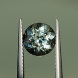 1.68CT ROUND MADAGASCAR SAPPHIRE, WHITE AND LIGHT YELLOW, UNTREATED, 7.1X4.6MM
