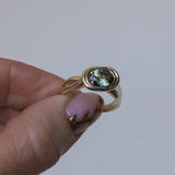 1.93ct Untreated Oval Brilliant Nigerian Parti Sapphire East-West Bezel Solitaire Alluvial Style Ring in 14k Green Gold