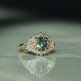 1.49ct Elongated Cushion Cut Montana Sapphire and Diamond Floral Halo in 18k Yellow Gold