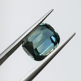 5.74CT UNTREATED CUSHION MADAGASCAR SAPPHIRE, PARTI DEEP TEAL BLUE, 10.2X8.8X7.2MM