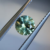1.08CT ROUND PRECISION CUT MONTANA SAPPHIRE, LIGHT GREEN YELLOW, 5.9X4.03MM