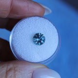 1.78CT ROUND PRECISION CUT MONTANA SAPPHIRE, LIGHTER BLUE GREY, 7.2X4.7MM