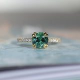 1.97ct Untreated Round Nigerian Teal Green Sapphire Double Prong Solitaire with Pave Set Diamonds in 18k Yellow Gold