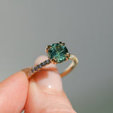 1.97ct Untreated Round Nigerian Teal Green Sapphire Double Prong Solitaire with Pave Set Diamonds in 18k Yellow Gold
