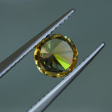 1.39CT ROUND PRECISION CUT MONTANA SAPPHIRE, BICOLOR YELLOW BLUE, 6.6X4.3MM