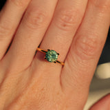 1.29CT ROUND MADAGASCAR SAPPHIRE, SILKY YELLOW GREEN PARTI, UNTREATED, 6.4X4.22MM