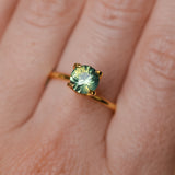 1.29CT ROUND MADAGASCAR SAPPHIRE, SILKY YELLOW GREEN PARTI, UNTREATED, 6.4X4.22MM