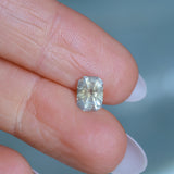 1.51CT RADIANT CUT MONTANA SAPPHIRE, ETHERIAL PARTI BLUE GOLD, 7.4X5.5X4.5MM