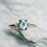 1.20ct Oval Brilliant Teal Montana Sapphire and Princess Cut Diamond Rapids Low Profile Ring in 14k Yellow Gold