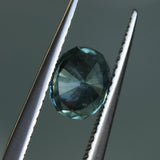 1.24CT PRECISION CUT OVAL MONTANA SAPPHIRE, EARTHY CARIBBEAN TEAL, 6.6X5.4X4.2MM