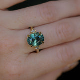 7.19ct Oval Light Teal Seafoam Madagascar Sapphire and Princess Cut Diamond Rapids Low Profile Ring in 18k Yellow Gold
