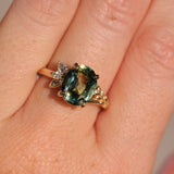 3.07ct Untreated Oval Madagascar Sapphire in Wandering Vine Low Profile 4 Prong Setting with Diamonds in 14k Yellow Gold