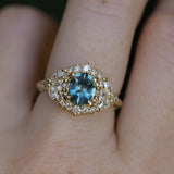 1.22ct Madagascar Geo Oval Sapphire and Diamond Floral Halo in 18k Yellow Gold