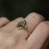 1.82ct Green Untreated Montana Marquise Sapphire in Wandering Vine Low Profile Bezel Setting with Pear Diamond in 14k Yellow Gold