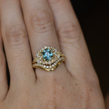 1.22ct Madagascar Geo Oval Sapphire and Diamond Floral Halo in 18k Yellow Gold
