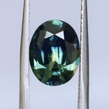 4.53CT OVAL MADAGASCAR SAPPHIRE, PARTI BLUE GREEN YELLOW, UNTREATED, 11.3X8.7X5.7MM