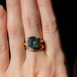 4.20ct Oval Blue Madagascar Sapphire in Wandering Vine Low Profile 4 Prong Setting with Diamonds in 18k Yellow Gold