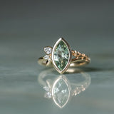 1.82ct Green Untreated Montana Marquise Sapphire in Wandering Vine Low Profile Bezel Setting with Pear Diamond in 14k Yellow Gold