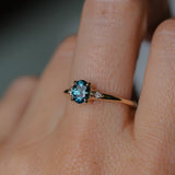 0.85ct Oval Deep Teal Montana Sapphire and Princess Cut Diamond Rapids Low Profile Ring in 14k Yellow Gold