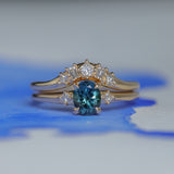 0.85ct Oval Deep Teal Montana Sapphire and Princess Cut Diamond Rapids Low Profile Ring in 14k Yellow Gold