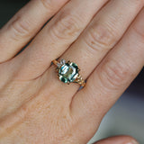 3.07ct Untreated Oval Madagascar Sapphire in Wandering Vine Low Profile 4 Prong Setting with Diamonds in 14k Yellow Gold