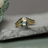1.65ct Emerald Cut Color Shifting Madagascar Sapphire Prong Set Ripple Contour Solitaire in 14k Yellow Gold