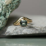 1.65ct Emerald Cut Color Shifting Madagascar Sapphire Prong Set Ripple Contour Solitaire in 14k Yellow Gold