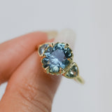 3.93ct Untreated Oval Teal Montana Sapphire and Trillion Australian Sapphire Three Stone Scallop Cup Antique Style with Milgrain Low Profile Ring in 18k Yellow Gold