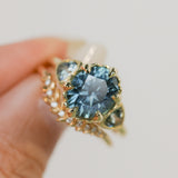 3.93ct Untreated Oval Teal Montana Sapphire and Trillion Australian Sapphire Three Stone Scallop Cup Antique Style with Milgrain Low Profile Ring in 18k Yellow Gold