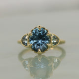 3.93ct Untreated Oval Teal Montana Sapphire and Trillion Australian Sapphire Three Stone Scallop Cup Antique Style with Milgrain Low Profile Ring in 18k Yellow Gold