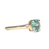 1.35ct Oval Brilliant Montana Sapphire and Princess Cut Diamond Rapids Low Profile Ring in 14k Yellow Gold
