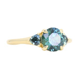 1.82ct Round Teal Precision Cut Montana Sapphire and Trillion Sapphire Low Profile Three Stone Ring in 18k Yellow Gold