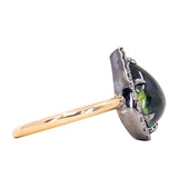 3.83ct Pear Cabochon Australian Sapphire and Blackened Halo ring in 18k Yellow Gold