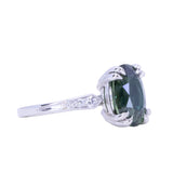 4.26ct Oval Deep Teal Madagascar Sapphire Double Claw Prong Low Profile Milgrain and Diamond Ring in Platinum