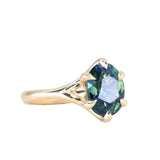 4.07ct Oval Deep Teal Sapphire Low Profile Six Prong Split Shank Solitaire in 14k Yellow Gold