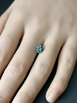 1.57CT ROUND PRECISION CUT MONTANA SAPPHIRE, BLUE GREEN, 6.91X4.55MM