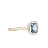 1.27ct Radiant Cut Madagascar Teal Sapphire Low Profile Bezel Solitaire Ring with French Set Diamonds in 14k Yellow Gold