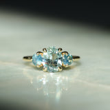 1.74ct Unheated Oval Montana Sapphire and Madagascar Sapphire Low Profile Three Stone Ring in 18k Yellow Gold