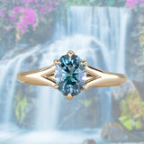 1.46ct Oval Precision Cut Montana Sapphire Low Profile Six Prong Split Shank Solitaire in 14k Yellow Gold