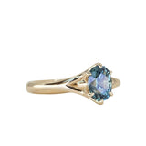 1.46ct Oval Precision Cut Montana Sapphire Low Profile Six Prong Split Shank Solitaire in 14k Yellow Gold